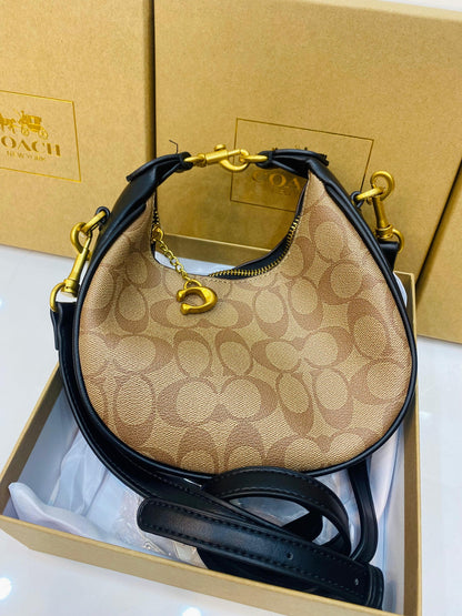 C0-ACH Jonie Crescent Crossbody - Creamy Almond (AZ)